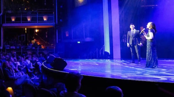 Savannah and David onstage BYU Athletics Cruise 0669